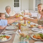 Shot of a family toasting during a sunday lunch.